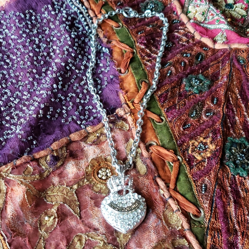 Juicy rhinestone necklace. Measures at 17 inches